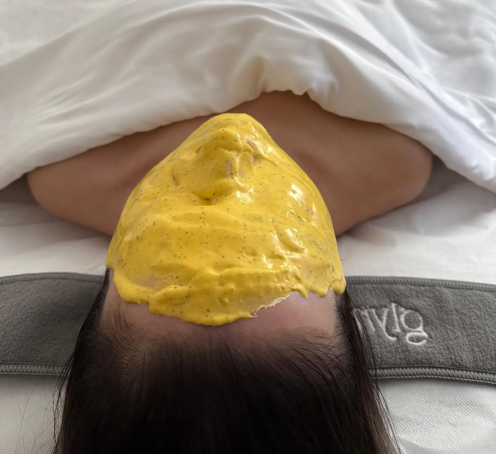 Hair styling and coloring service in progress